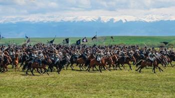 A Legend: Soldiers on horse back holding flags and swords