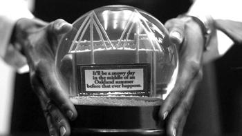 A Snowy Day in Oakland Movie: A black and white picture of hands holding a snow globe