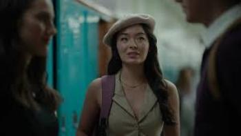 Abducted on Prom Night: Young woman in beret smiles in hallway