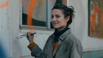 Acidman Movie Poster: Dianna Agron and Thomas Haden Church's faces appear at the top, while below the two of them, along with Migo the dog, watch dots