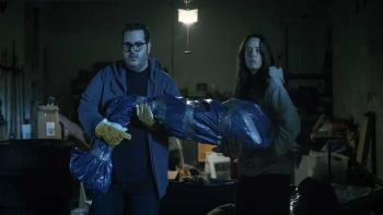 Adulthood movie: Josh Gad and Kaya Scodelario are startled while carrying a body wrapped in a bag