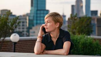After the Wedding Movie: Isabel is shown on a city rooftop, talking on the phone
