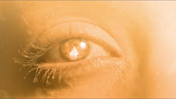 After Death Movie: A single human eye seems to be reflecting a brilliant, warm light, which also makes the person's skin glow