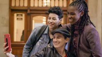 Ahead of the Curve: three women pose