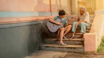 A Letter to My Youth Movie: A young boy plays guitar for an older man