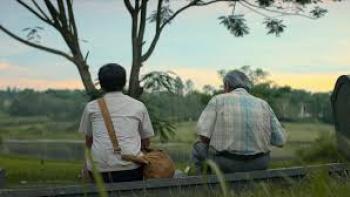 A Letter to My Youth Movie: Young boy and older man face away, sitting on a fence