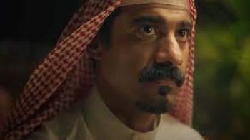 AlKhallat+: man with turban stares ahead