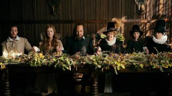 All Is True Movie: Shakespeare sits at a long table with his family