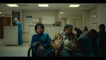 Allswell in New York movie: Liza Colón-Zayas and Felix Solis sit together in a hospital lobby