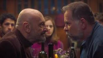 Almost Family: Older man leans menacingly at other man