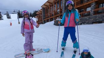 American Girl: Corinne Tan: Kai and Maya Cech on skis.