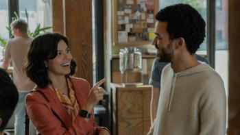The American Society of Magical Negroes Movie: An-Li Bogan and Justice Smith laugh with each other