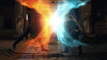 Angels Fallen: Michael Teh and Houston Rhines fight with orange and blue energy shields in a darkened room