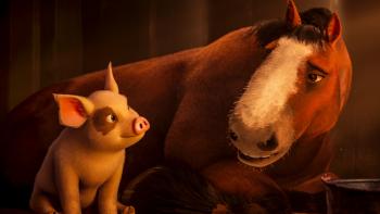 Animal Farm movie: A young pig and an old horse sit next to each other in a barn, smiling