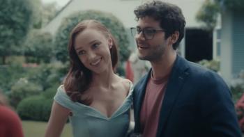 Anniversary movie: Phoebe Dynevor and Dylan O'Brien chat with another guest at an outdoor party