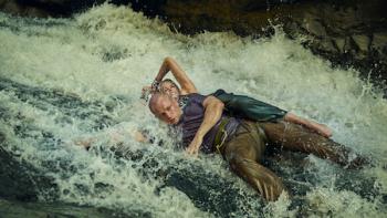 Apex: Charlize Theron and Taron Egerton carried away in the rapids.