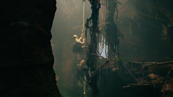 Apex: Figures hanging in a cave.