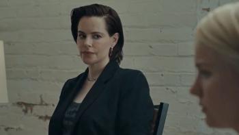 Appendage: Emily Hampshire looks at Hadley Robinson.
