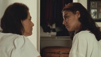 Atonement movie: Iraqi mother and daughter talk in a hallway