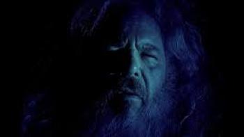 Atrabilious movie: Mark Boone Junior is in shadows amid blue lighting