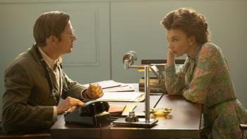 Audrey's Children movie: Natalie Dormer sits at a desk across from Jimmi Simpson