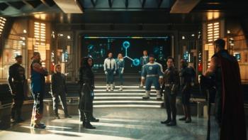 Avengers: Doomsday Movie: Avengers gathered in a futuristic room, facing each other with a digital screen in the background