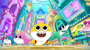 Baby Shark's Big Movie: Colorful image of animated sharks smiling while singing