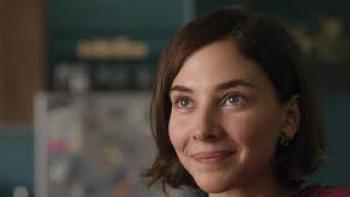 Basma: a woman smiles