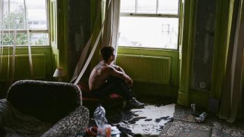 Bird: Barry Keoghan, shirtless, looking out of a window