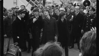 Beatles '64: The band in a crowd.