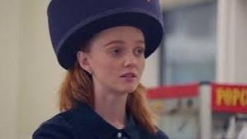 Before the Ice Melts movie: Molly Peyton wearing a large blue hat indoors.