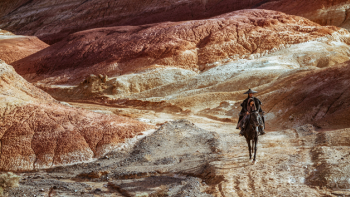 Blades of the Guardians movie: Jing Wu walks in a mountainous landscape