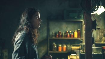 Blood Movie: Michelle Monaghan seems shocked by something she sees in a basement