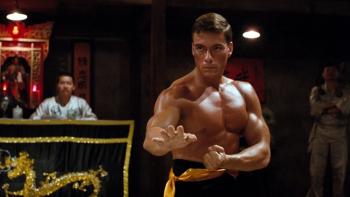 Bloodsport Movie: In the Kumite ring, Frank Dux (Jean-Claude Van Damme) flexes and prepares to face an opponent