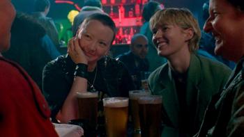 Blue Jean: Two White women are seen laughing and drinking with friends in a pub