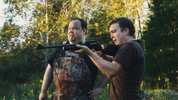 Blue Ruin: Two middle-aged White men do target practice with guns