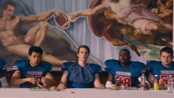 Bottoms Movie: Jeff sits at the center of a dinner table set in a Last Supper-type arrangement