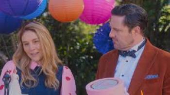 Bride of the Year: Man in red jacket and woman in pink, surrounded by colorful paper lanterns.