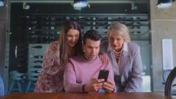 Bride of the Year: Three people looking at a smartphone, appearing surprised and curious.