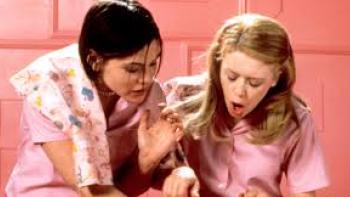 But I'm a Cheerleader Movie: Clea Duvall and Natasha Lyonne wear pink in a pink room.