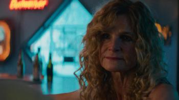 Carolina Caroline movie: Caroline's estranged mother (Kyra Sedgwick) sits in a bar