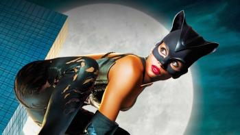 Catwoman movie: Catwoman crouching against full moon backdrop