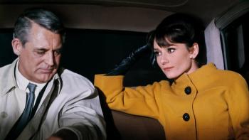 Charade: Audrey Hepburn looks fondly at Cary Grant in the back of a car
