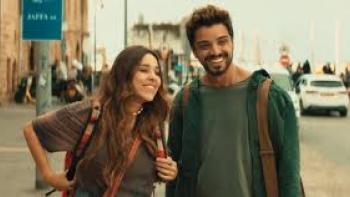 Cheers to Life: Man and woman smile outdoors