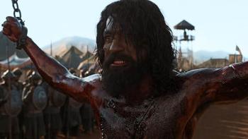 Chhaava: Vicky Kaushal as Chhaava is seen shirtless, covered in blood, hands tied with chains to wooden posts