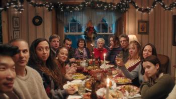 Christmas Eve in Miller's Point Movie: A large family gathers around a table for a festive feast