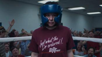 Christy movie: Sydney Sweeney as boxer Christy Martin training in the ring, wearing a boxing helmet and a Dr. Pepper T-shirt