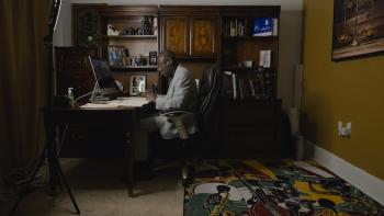 Attorney Ben Crump seated in office
