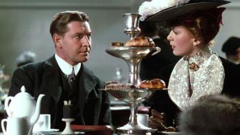 The Life and Death of Colonel Blimp: Roger Livesey and Deborah Kerr sit together having tea, both dressed formally