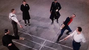 The Life and Death of Colonel Blimp: Roger Livesey and Anton Walbrook hold their swords out at the start of a duel